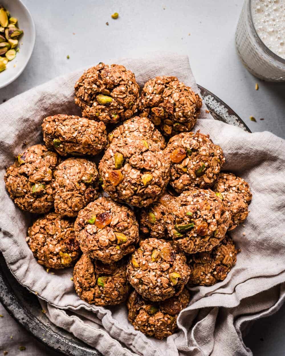 A whole batch of chai cookies on a plate on a table.