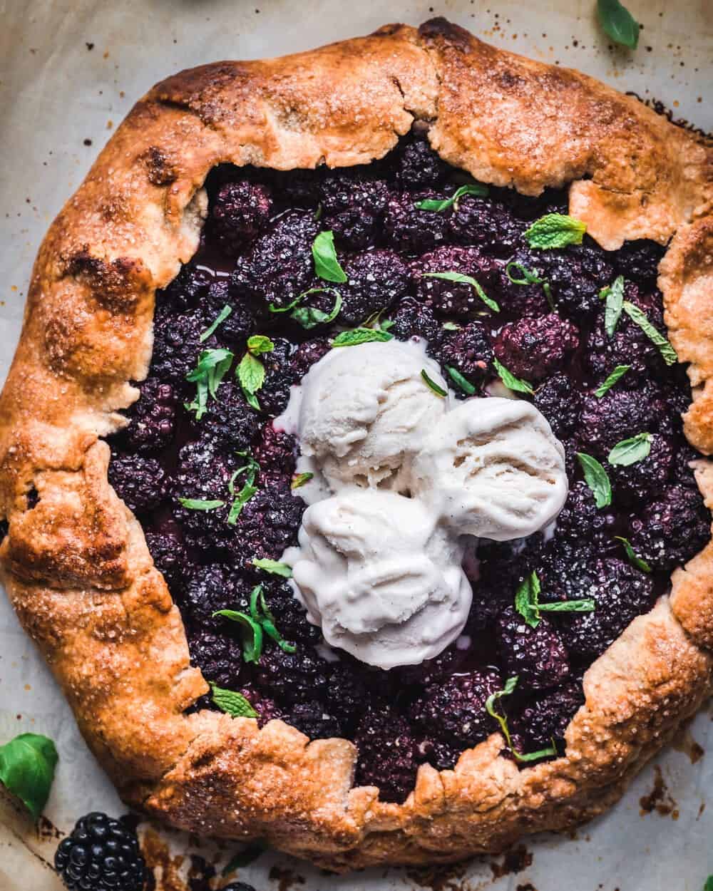 Blackberry galette with herbs and ice cream.