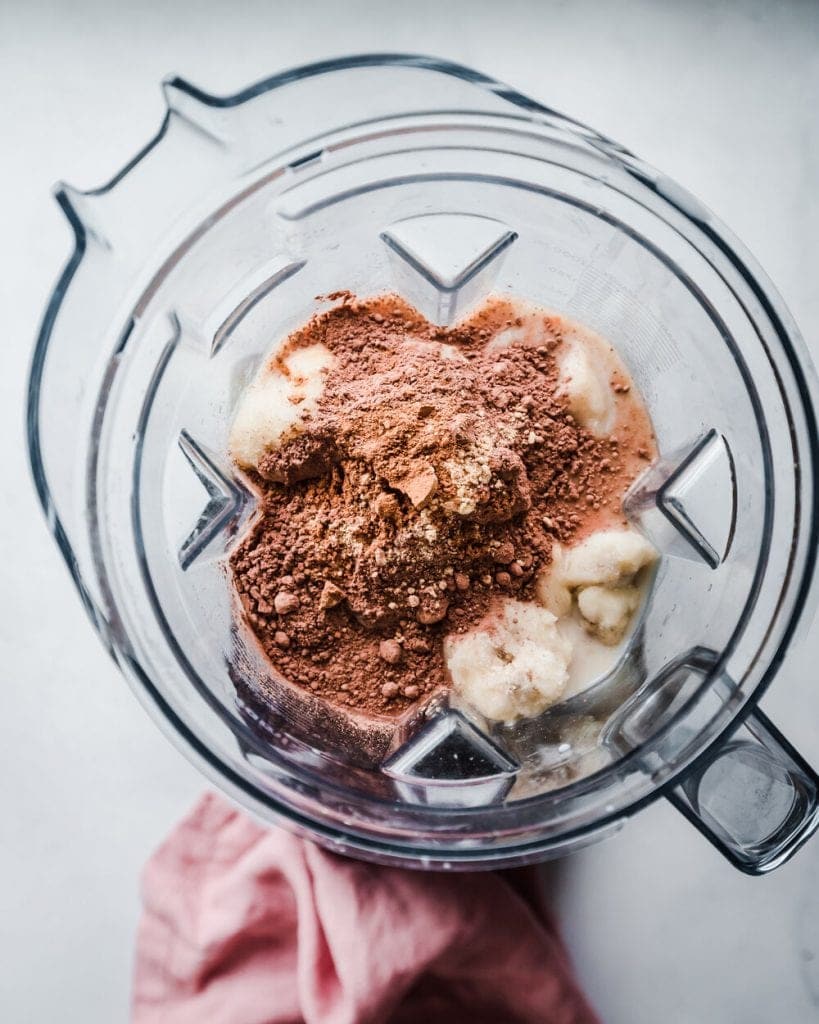 cacao being added to blender