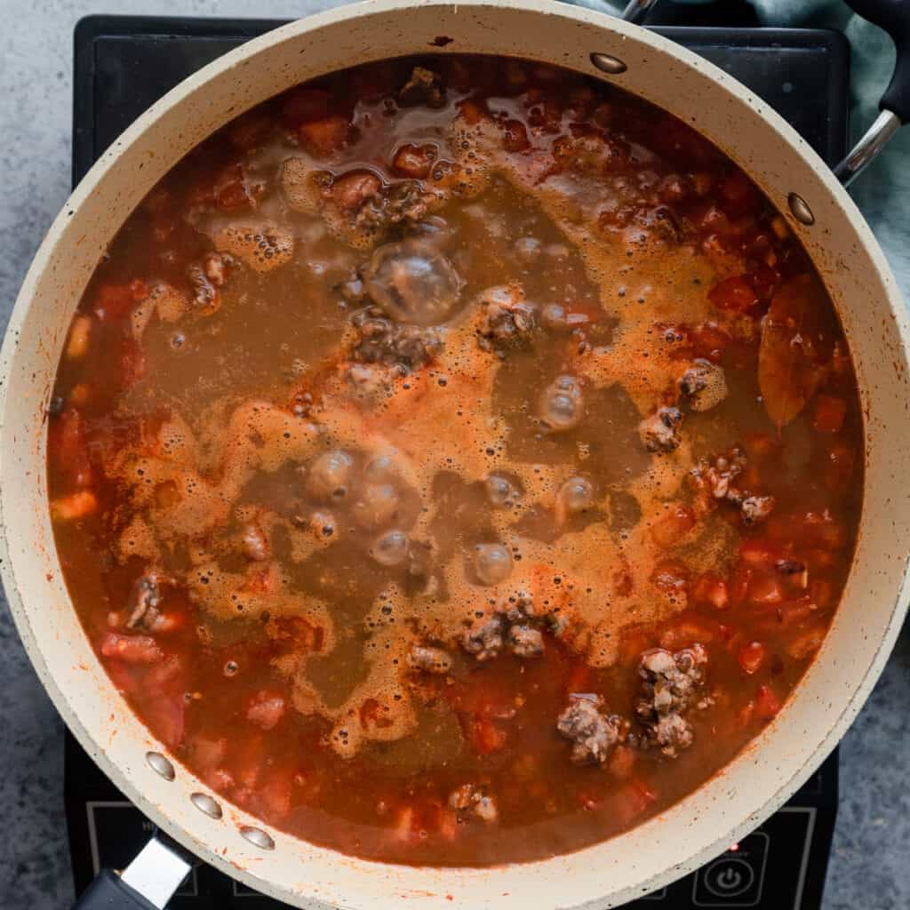 vegan dal makhani simmering in a saute pan