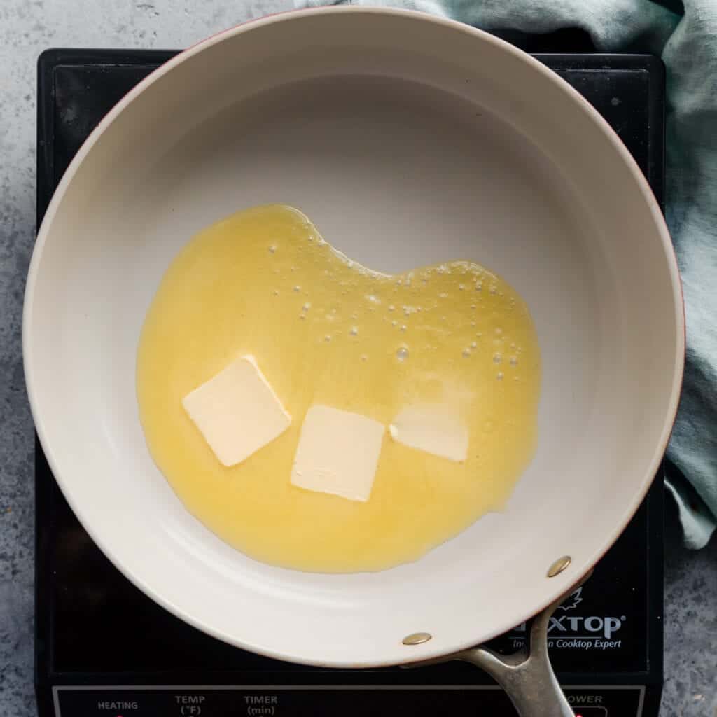 melting vegan butter in a frying pan