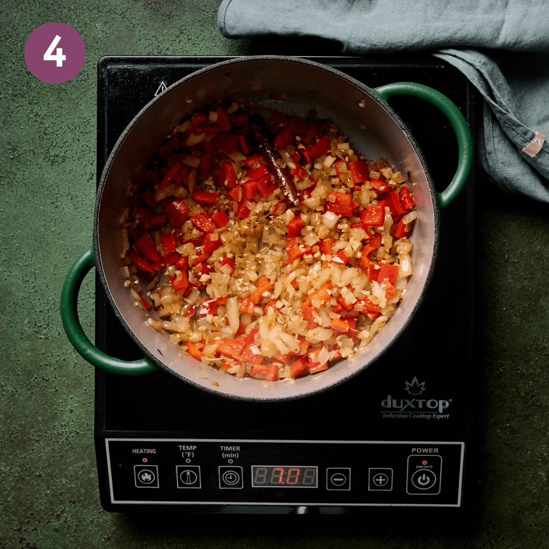 Onion bell pepper mixture after it's been cooked for a few minutes.