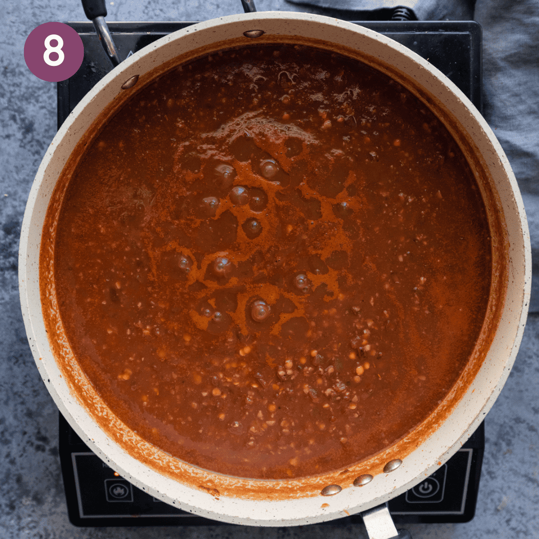 Bubbling lentil mixture in the pan.